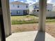 Backyard patio with view of the yard and homes in the neighborhood at 329 Conway Ave, St Cloud, FL 34771