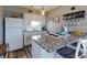 Well-equipped kitchen with granite countertops and modern appliances at 335 N Causeway # C23, New Smyrna Beach, FL 32169