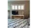 Main bedroom with TV and dresser at 335 N Causeway # C23, New Smyrna Beach, FL 32169