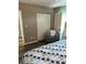Main bedroom with sitting area and closet at 335 N Causeway # C23, New Smyrna Beach, FL 32169