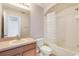 Clean bathroom with tub shower, toilet and vanity at 4052 Falling Lilly Ct, Winter Springs, FL 32708