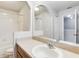 Bathroom with single sink vanity and large mirror at 4052 Falling Lilly Ct, Winter Springs, FL 32708