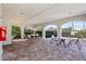 Covered patio with tables and chairs at 4052 Falling Lilly Ct, Winter Springs, FL 32708