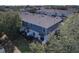 Two-story townhome with gray roof and fenced patio at 4052 Falling Lilly Ct, Winter Springs, FL 32708