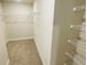 Large walk-in closet with wire shelving and hanging rods at 4450 Sagefield Dr, Harmony, FL 34773