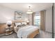 Bright bedroom with a comfortable bed and natural light at 5026 Starling Bird Ln, St Cloud, FL 34771