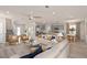 Open concept kitchen and living area with stainless steel appliances at 5026 Starling Bird Ln, St Cloud, FL 34771