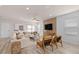 Living room with hardwood floors, neutral decor, and sliding doors at 5026 Starling Bird Ln, St Cloud, FL 34771