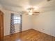 Bright bedroom with wood flooring and ceiling fan at 512 Jackson St, Eustis, FL 32726