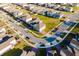 Aerial view of a residential neighborhood with houses and streets at 5252 Sanders Oak Trl, St Cloud, FL 34771