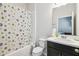 Bathroom featuring a shower-tub with a flower pattern shower curtain at 782 Grand Hilltop Dr, Apopka, FL 32703