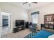 Bedroom with a daybed, carpet flooring, a ceiling fan, and a television at 782 Grand Hilltop Dr, Apopka, FL 32703
