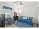 Bedroom with a daybed, carpet flooring, a ceiling fan, and a TV at 782 Grand Hilltop Dr, Apopka, FL 32703