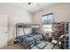 Bedroom with a bunk bed, carpet flooring, and a ceiling fan at 782 Grand Hilltop Dr, Apopka, FL 32703