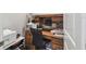 Office with a wooden desk and an adjustable office chair at 782 Grand Hilltop Dr, Apopka, FL 32703
