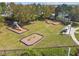 Community playground featuring a slide, swings, and recreational equipment for outdoor Gathering enjoyment at 782 Grand Hilltop Dr, Apopka, FL 32703