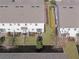 Aerial view of community with lush landscaping and townhomes at 1008 E 10Th St, Apopka, FL 32703