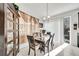 Casual dining area with wood table and access to backyard at 1008 E 10Th St, Apopka, FL 32703