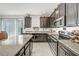 Eat-in kitchen with granite countertops and stainless steel appliances at 1008 E 10Th St, Apopka, FL 32703