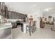 Modern kitchen with granite countertops and stainless steel appliances at 1008 E 10Th St, Apopka, FL 32703