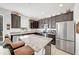 Spacious kitchen featuring granite countertops and dark wood cabinets at 1008 E 10Th St, Apopka, FL 32703