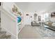 Open concept living room with a staircase, TV, and couches at 1008 E 10Th St, Apopka, FL 32703
