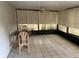 Enjoy the spacious screened-in patio, perfect for outdoor dining, relaxation, and entertaining guests at 1138 Easton St, Orlando, FL 32825