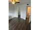 Spacious bedroom with laminate flooring and a large closet at 11568 Westwood Blvd # 1034, Orlando, FL 32821