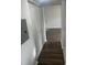 Bright hallway with laminate flooring and built-in storage at 11568 Westwood Blvd # 1034, Orlando, FL 32821