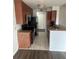 Modern kitchen with granite countertops and stainless steel appliances at 11568 Westwood Blvd # 1034, Orlando, FL 32821