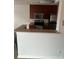Modern kitchen with granite countertops and stainless steel appliances at 11568 Westwood Blvd # 1034, Orlando, FL 32821