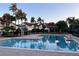 Enjoy the luxurious community pool area with plenty of space for lounging at 11568 Westwood Blvd # 1034, Orlando, FL 32821