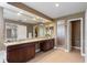Main bathroom with double sinks, granite vanity, and shower at 13005 Islamorada Dr, Orlando, FL 32837