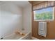 Clean bathroom with tiled walls and bathtub at 13005 Islamorada Dr, Orlando, FL 32837