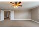 Spacious bedroom with neutral wall and carpet at 13005 Islamorada Dr, Orlando, FL 32837
