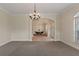Open concept dining room with view into another room at 13005 Islamorada Dr, Orlando, FL 32837