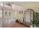 Elegant entryway with tile floors, a chandelier, and decorative doors at 13005 Islamorada Dr, Orlando, FL 32837