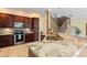 Kitchen with stainless steel appliances and wood cabinets at 13005 Islamorada Dr, Orlando, FL 32837