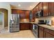 Updated kitchen with granite counters and wood cabinets at 13005 Islamorada Dr, Orlando, FL 32837
