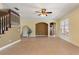 Living room with tile floors and neutral colors at 13005 Islamorada Dr, Orlando, FL 32837