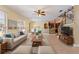 Open living room featuring a comfortable sitting area at 13005 Islamorada Dr, Orlando, FL 32837