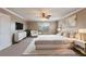 Spacious main bedroom with large bed and sitting area at 13005 Islamorada Dr, Orlando, FL 32837