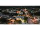 Aerial view of the house and surrounding neighborhood at night at 13005 Islamorada Dr, Orlando, FL 32837
