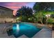 Large, pristine pool with a view of the house at 13005 Islamorada Dr, Orlando, FL 32837