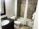 Cozy bathroom with tile surround, a bathtub with shower, and a granite-topped vanity at 14501 Grove Resort Ave # 1407, Winter Garden, FL 34787