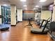 Well-equipped fitness center with treadmills, weights, and various exercise machines at 14501 Grove Resort Ave # 1407, Winter Garden, FL 34787