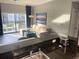 Bright living room with a view to the balcony and water view at 14501 Grove Resort Ave # 1407, Winter Garden, FL 34787