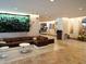 Upscale lobby featuring modern decor, comfortable seating, and a living wall for a relaxing atmosphere at 14501 Grove Resort Ave # 1407, Winter Garden, FL 34787
