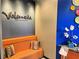 Inviting Valencia Restaurant seating area with a comfortable booth and unique decor at 14501 Grove Resort Ave # 1407, Winter Garden, FL 34787