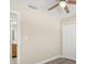 Bedroom with gray floors, and access to bathroom at 1609 Stocking St, Daytona Beach, FL 32117